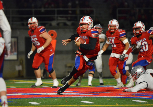 Joueurs de football Diablos en action